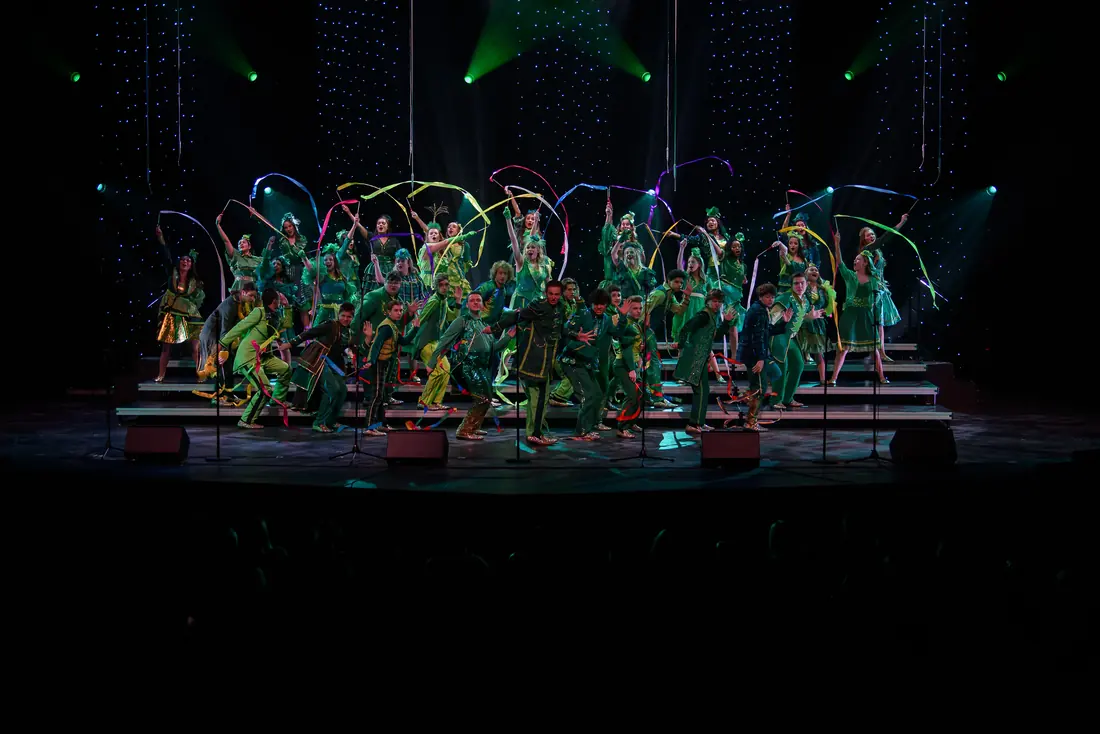 Wide view of a live event stage produced by SPRK