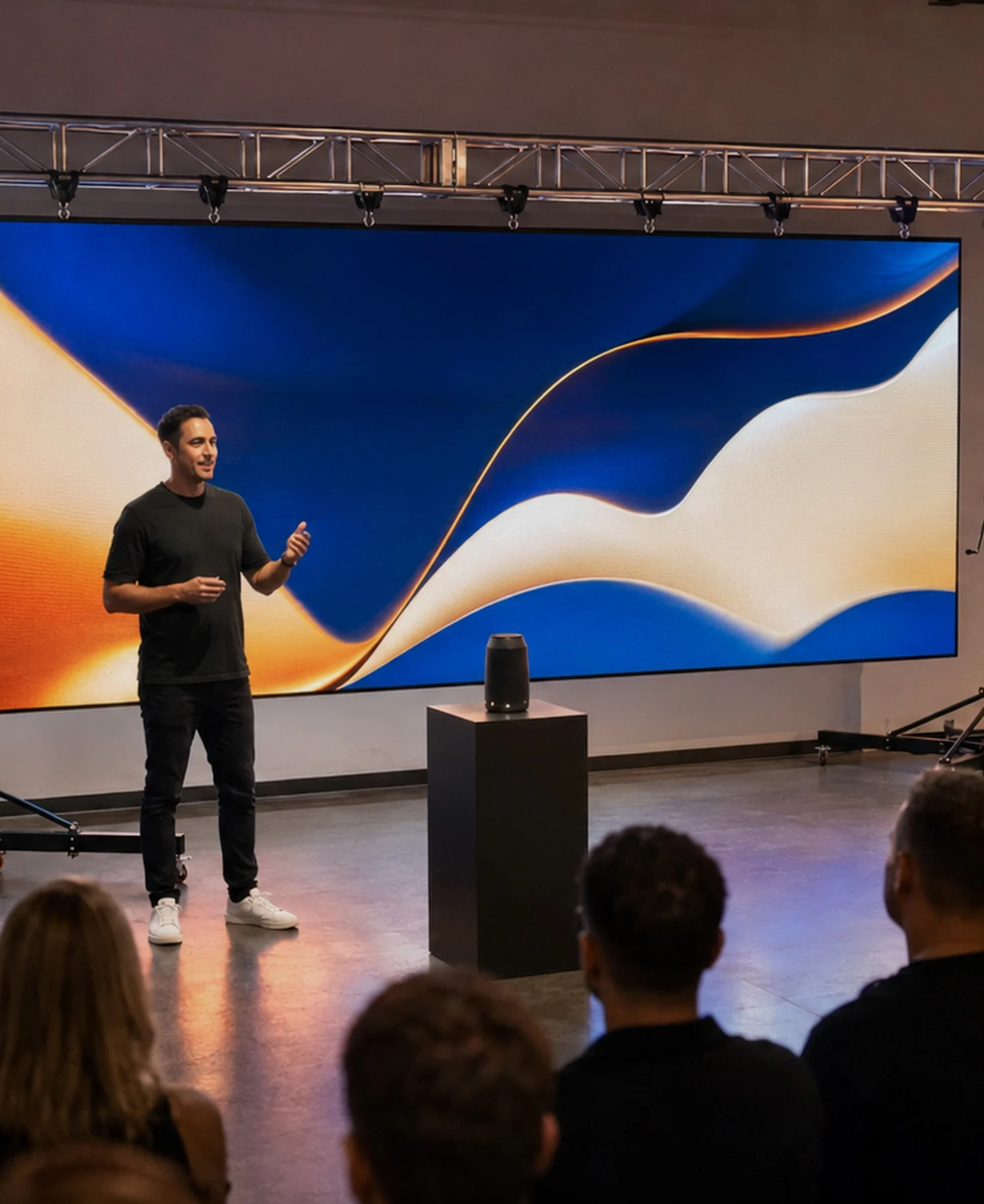 Illustrative rendering of a corporate presenter in front of a large LED video wall